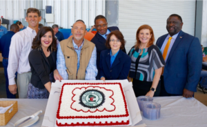 Benny Cenac, business owner and philanthropist, celebrated with their partner for maritime education at the Maritime and Corporate Training Center in Houma.